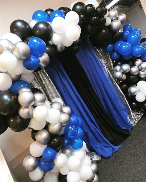 black and blue balloon garland